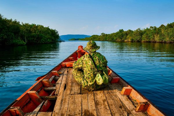 A ranger patrols by canoe in the Southern Cardamom project, Cambodia.