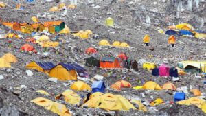 Plastic and waste scattered on Mount Everest displaying the issue of overtourism